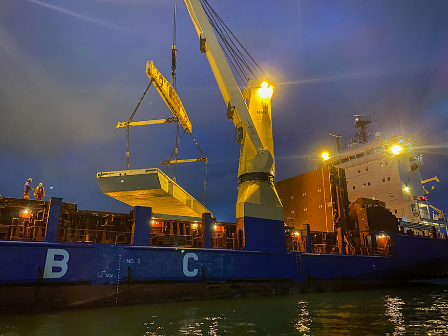 Wave attenuator and ship at night